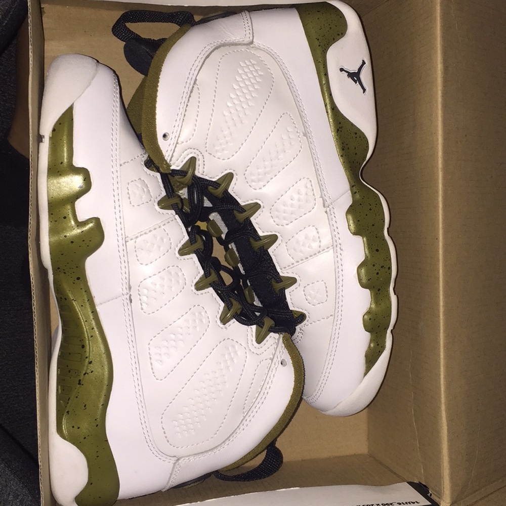 Statue on feet Jordan 9s size 4y/6 in women